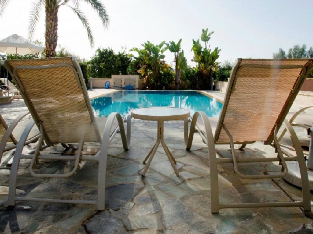 Villa Saraliana Sandy Beach Villas - Heated Pool - Jacuzzi - Private Beach Area Polis الغرفة الصورة