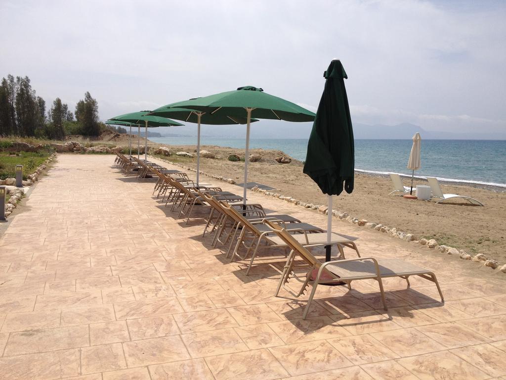Villa Saraliana Sandy Beach Villas - Heated Pool - Jacuzzi - Private Beach Area Polis الغرفة الصورة